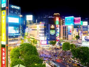 a busy city street at night with many buildings at Shibuya Excel Hotel Tokyu in Tokyo