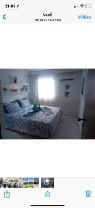 Cama ou camas em um quarto em MARUPIARA SUITES- FLAT MURO ALTO