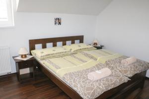 Posteľ alebo postele v izbe v ubytovaní Penzión Rodus