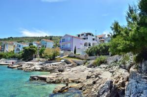 a group of houses on the shore of a river at Apartment Toni 555 in Primošten