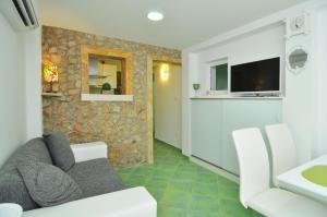 Posezení v ubytování Apartments Tojčić