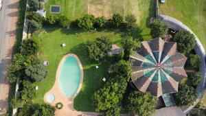 an overhead view of an amusement park with a ferris wheel at Lido Hotel in Johannesburg