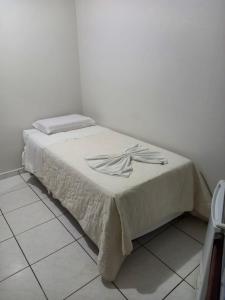 Ein Bett oder Betten in einem Zimmer der Unterkunft Hamara Soft Hotel 1