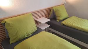 Postel nebo postele na pokoji v ubytování Guesthouse Petit Pré