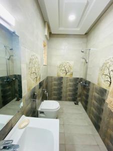 Een badkamer bij Continental boutique House