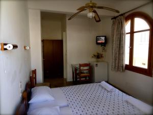 Cama o camas de una habitación en Eleni's Rooms