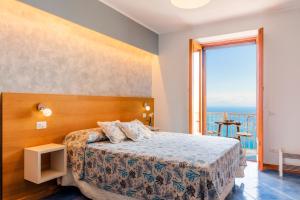 Кровать или кровати в номере A casa di Nonna Marianna