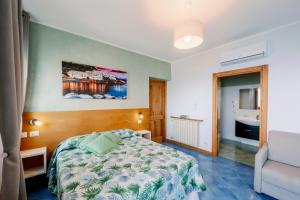 Postel nebo postele na pokoji v ubytování A casa di Nonna Marianna