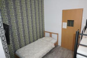 Llit o llits en una habitació de Hostel4u