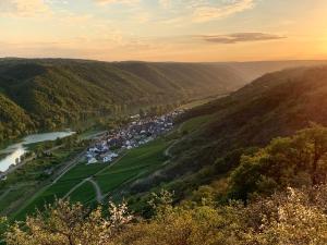 an aerial view of a river in a valley at Ferienwohnung Am Bachlauf in Pommern