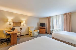 Postel nebo postele na pokoji v ubytování Extended Stay America Suites - Lawton - Fort Sill