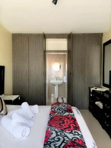 Katil atau katil-katil dalam bilik di Estee House