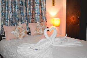 Postelja oz. postelje v sobi nastanitve Spectrum Hub beach side Studio Apartment - Candolim - Goa