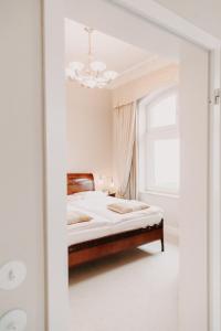 Postel nebo postele na pokoji v ubytování Hotel Miramar