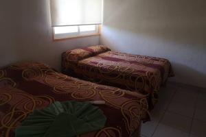 Postel nebo postele na pokoji v ubytování C4 casa segundo nivel peñita con alberca privada