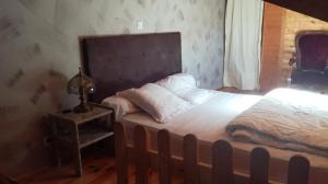 Postel nebo postele na pokoji v ubytování gîte l'Escoferii