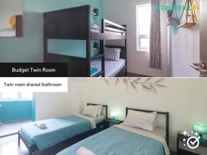 Uma cama ou camas num quarto em Wonderloft Hostel Kota Tua