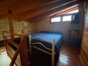 Łóżko lub łóżka w pokoju w obiekcie Fattoria Il Noce B&B