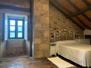 Katil atau katil-katil dalam bilik di Casa Goris