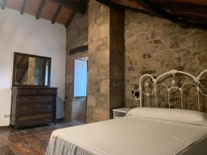A bed or beds in a room at Casa Goris