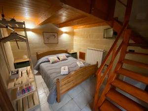 Łóżko lub łóżka w pokoju w obiekcie Fattoria Il Noce B&B