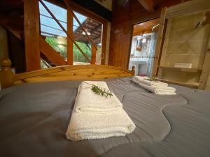 Łóżko lub łóżka w pokoju w obiekcie Fattoria Il Noce B&B