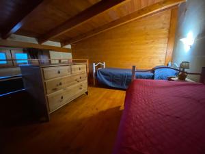 Łóżko lub łóżka w pokoju w obiekcie Fattoria Il Noce B&B