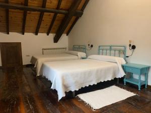 A bed or beds in a room at Casa Goris