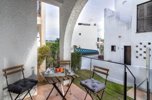 Photo de la galerie de l'établissement WintowinRentals Townhouse, Roof Terraze & Pool, à Torre de Benagalbón