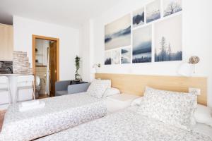 Apartamentos Ohana - Edificio Tonillo客房内的一张或多张床位