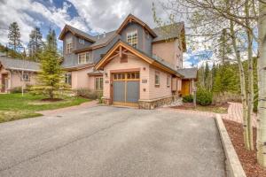 a large house with a driveway in front of it at Private Family Friendly 2 Bedroom Townhome Located In East Keystone With Access To Free Shuttle Service in Keystone