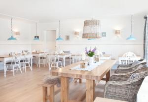 Ein Sitzbereich in der Unterkunft Belle Maison - Das kleine Hotel