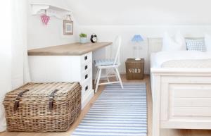 Ein Bett oder Betten in einem Zimmer der Unterkunft Belle Maison - Das kleine Hotel