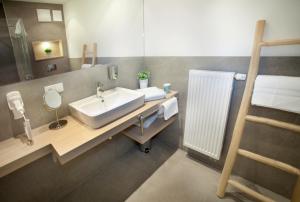 Ein Badezimmer in der Unterkunft Belle Maison - Das kleine Hotel