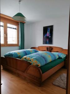 Postel nebo postele na pokoji v ubytování Ferienwohnung Paradiso 1