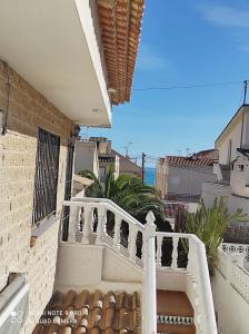 A balcony or terrace at Bungalow soleado a 100 metros de La Playa