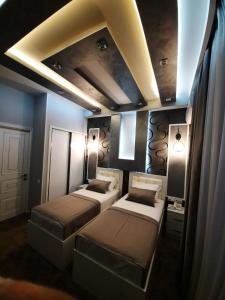 Postel nebo postele na pokoji v ubytování Hotel Juliet Yerevan