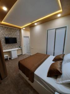 Postel nebo postele na pokoji v ubytování Hotel Juliet Yerevan
