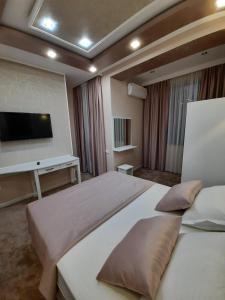 Postel nebo postele na pokoji v ubytování Hotel Juliet Yerevan