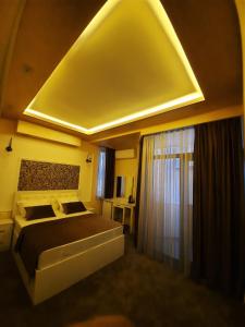 Postel nebo postele na pokoji v ubytování Hotel Juliet Yerevan