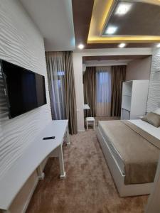 Postel nebo postele na pokoji v ubytování Hotel Juliet Yerevan