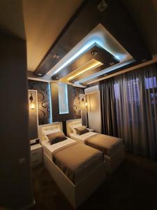 Postel nebo postele na pokoji v ubytování Hotel Juliet Yerevan