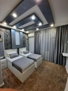 Postel nebo postele na pokoji v ubytování Hotel Juliet Yerevan