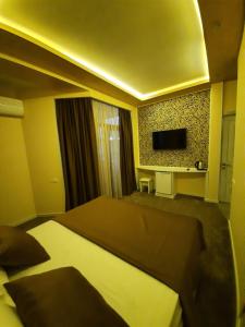 Postel nebo postele na pokoji v ubytování Hotel Juliet Yerevan