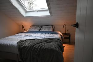 Postel nebo postele na pokoji v ubytování La maison du pêcheur Koksijde