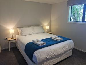 Ένα ή περισσότερα κρεβάτια σε δωμάτιο στο Scott Street Apartments