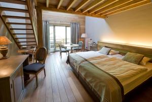 Postel nebo postele na pokoji v ubytování Hotel La Ferronniere