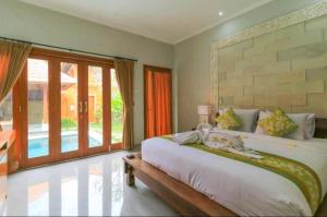 Three Brothers Bungalows & Villas客房内的一张或多张床位