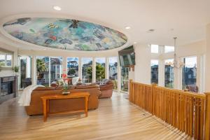 a living room with a large painting on the ceiling at Oceanview Miramar Home Steps to Beach Restaurants Trails Activities in Half Moon Bay