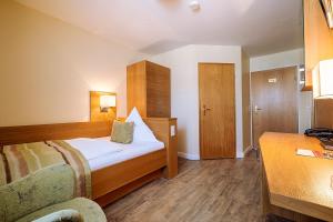 Voodi või voodid majutusasutuse Hotel Neuwarft Altbau toas